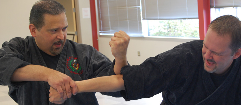 picture of Professor Israel Gonzales breaking arm